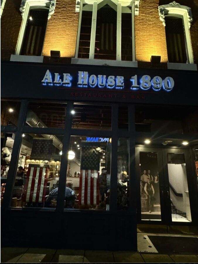 Ale House 1890 restaurant storefront at night in Lancaster